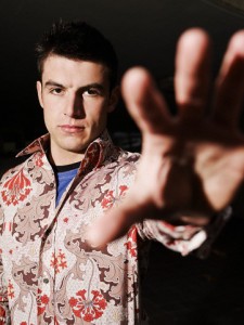 Young Man Reaching Out Hand Young Man Reaching Out Hand